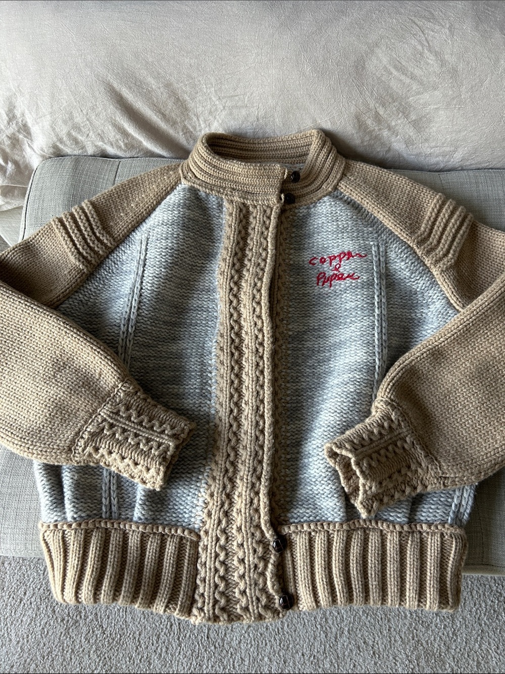 We The Free Beige and Light Gray Cable-Knit Zip Cardigan with Red Script